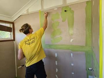 Edward applying waterproofing membrane